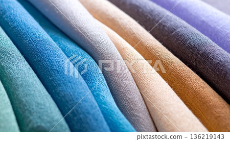 Colorful background illustration of high-quality fabric layers. Material for apparel and interior design catalogs. 136219143