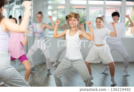 Group of boys and girls dancing dancehall Group of boys and girls dancing dancehall 136219492