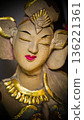 serene Bali dancer ceramic bust featuring closed eyes, bright lips, and gold embellishments. Ideal decorative sculpture for home, temple, or gallery displays, emphasizing art, culture, and craft 136221361