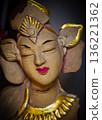 serene Bali dancer ceramic bust featuring closed eyes, bright lips, and gold embellishments. Ideal decorative sculpture for home, temple, or gallery displays, emphasizing art, culture, and craft 136221362
