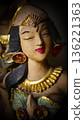 serene Bali dancer ceramic bust featuring closed eyes, bright lips, and gold embellishments. Ideal decorative sculpture for home, temple, or gallery displays, emphasizing art, culture, and craft 136221363