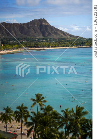 Hawaii Waikiki Beach and Diamond Head, a spectacular resort landscape with blue ocean and sky Hawaii Waikiki Beach and Diamond Head, a spectacular resort landscape with blue ocean and sky 136222593
