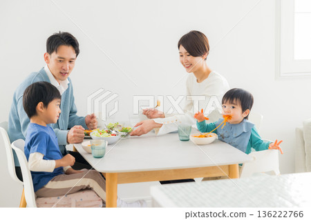 Family eating at the dining table Family eating at the dining table 136222766