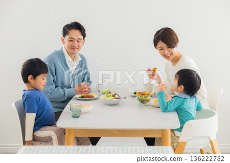 Family eating at the dining table Family eating at the dining table 136222782