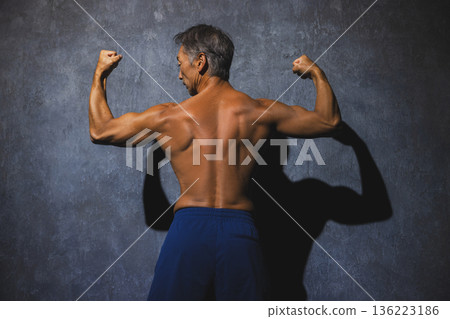 A man stretching A man stretching 136223186