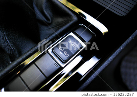 Car Drive Mode Selection, A close-up of the Sport and Eco Pro drive mode buttons Car Drive Mode Selection, A close-up of the Sport and Eco Pro drive mode buttons 136223287