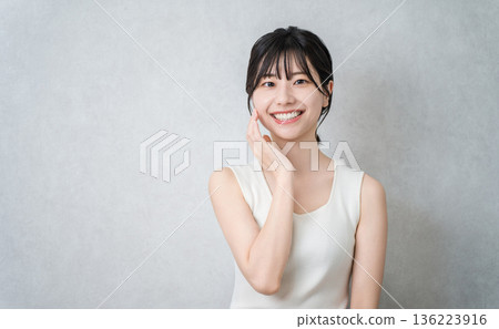 Asian woman with beautiful skin doing skin care (beauty/skin care image) Asian woman with beautiful skin doing skin care (beauty/skin care image) 136223916
