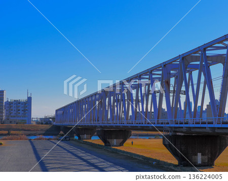 Railway bridge on the Keisei Main Line heading towards Chiba Railway bridge on the Keisei Main Line heading towards Chiba 136224005