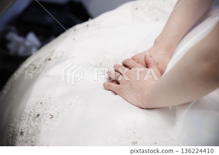 An image of a wedding ceremony where a nervous bride and groom enter 136224410