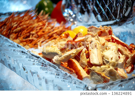Top view of Alaskan crab legs or Alaska King Crab in Restaurant, focus selective 136224891