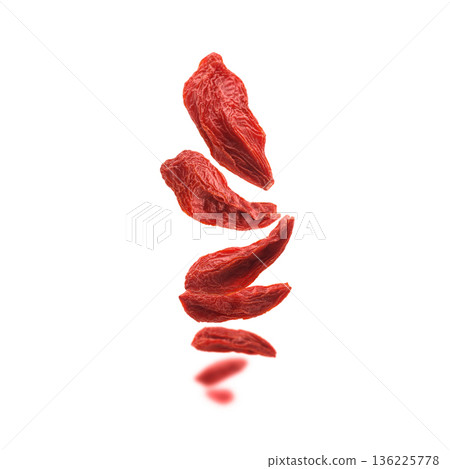 Dry Goji berries levitate on a white background 136225778
