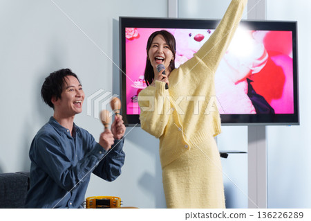 Couple on a karaoke date Couple on a karaoke date 136226289