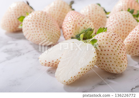Fresh white strawberries 136226772