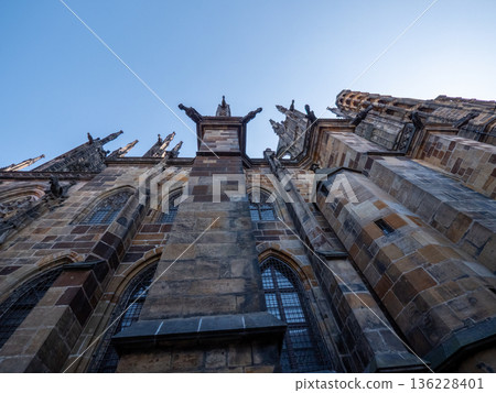 St. Vitus Cathedral located within the Prague Castle complex in Prague, Czech Republic. St. Vitus Cathedral located within the Prague Castle complex in Prague, Czech Republic. 136228401