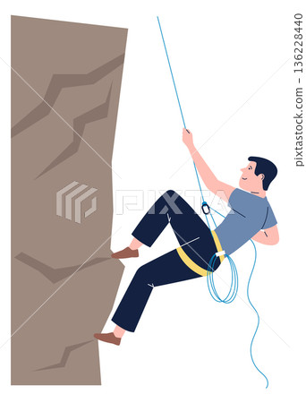 Man climbing on stone wall with rope professional equipment 136228440