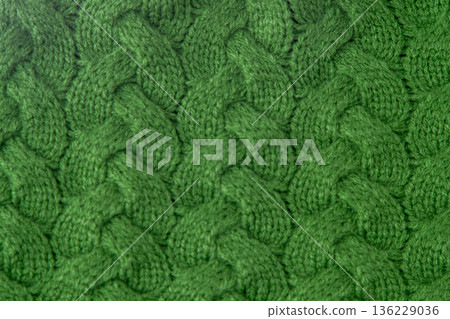 Green Cable Knit Fabric woolen sweater background Green Cable Knit Fabric woolen sweater background 136229036