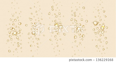 Sparkling champagne bubbles rising in golden drink 136229168