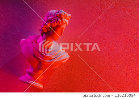 Neon Pink Red Gradient Classical Apollo Bust Sculpture on Textured Wall Copy Space 136230084