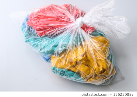Clothes packed in a clear bag Clothes packed in a clear bag 136230882
