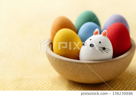 Happy Easter eggs in a bowl on dot yellow color background. Easter decoration Selective focus. Happy Easter eggs in a bowl on dot yellow color background. Easter decoration Selective focus. 136230886