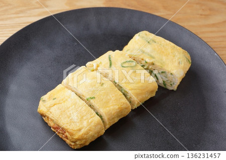 Rolled egg with spring onion 136231457
