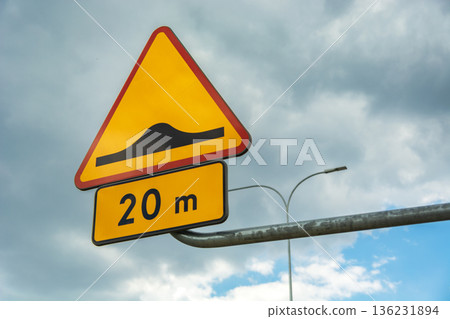 Road sign speed bump against the sky 136231894