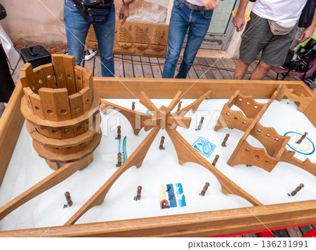 The traditional wooden table game Pirli, also known as Pirulin at Tocati Verona 136231991