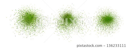 Isolated green matcha dust and powder splashes with mint spray effect and flying green leaves, top view on white background. Isolated green matcha dust and powder splashes with mint spray effect and flying green leaves, top view on white background. 136233111