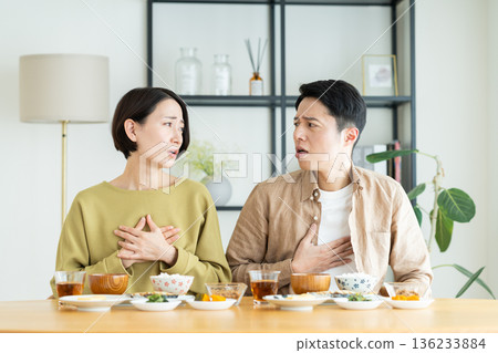 Middle-aged couple having breakfast at home Middle-aged couple having breakfast at home 136233884