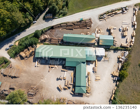 Aerial view of a sawmill factory in the mountains  136235140