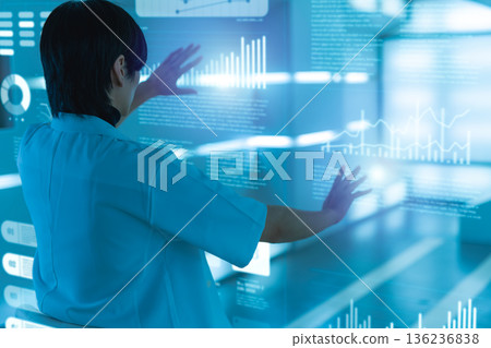 A technician operating a holographic interface 136236838