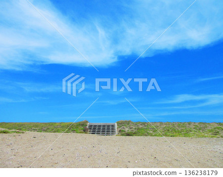 Seaside bank stairs, blue sky and sandy beach scenery Seaside bank stairs, blue sky and sandy beach scenery 136238179