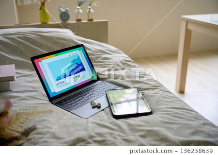 Working from home in bed 136238639