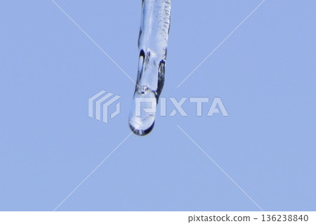 Icicles and blue sky 136238840