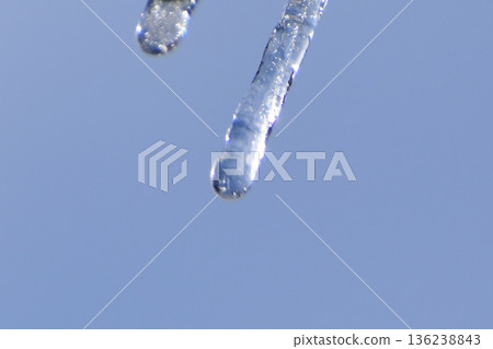 Icicles in the blue sky Icicles in the blue sky 136238843