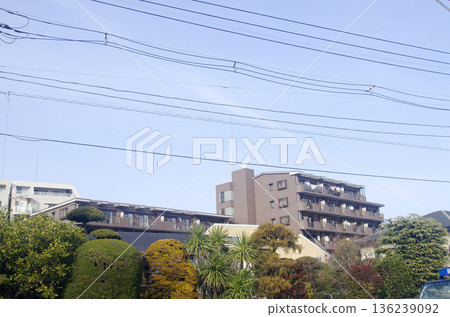 Apartment buildings lined up along Kanpachi Street 136239092