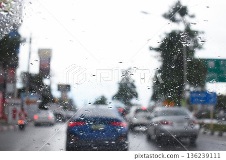 car on highway road with rainny season, blurred image car on highway road with rainny season, blurred image 136239111