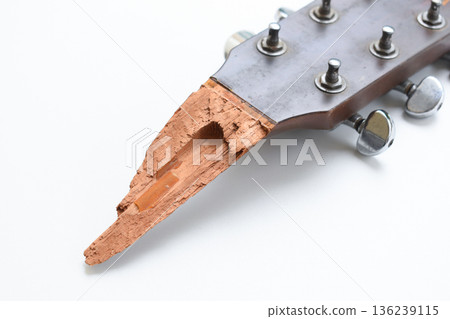 part of broken wood acoustic guitar isolated on white background 136239115