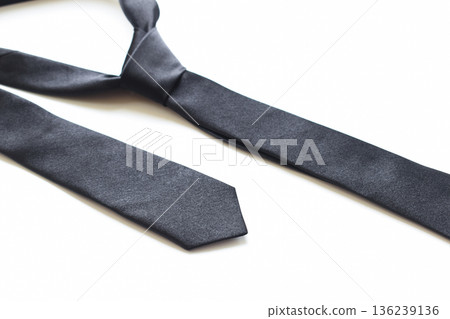 black necktie isolated on white background, father day concept and business style black necktie isolated on white background, father day concept and business style 136239136