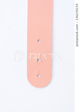 light pink leather strap isolated on white background light pink leather strap isolated on white background 136239154
