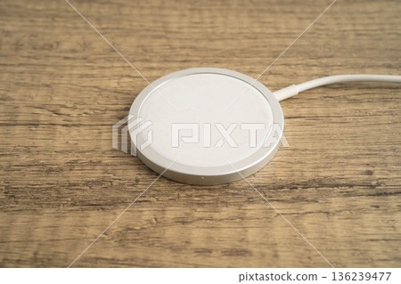 Wireless charger, magnetic charging modern equipment of mobile phone. 136239477