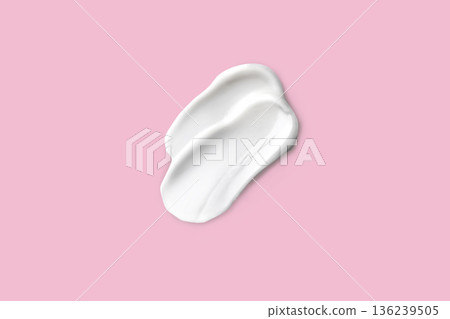 Beauty swatch sampled with a smear of white cream. Face skin care, hand care, facial care. Isolated photo pink background 136239505