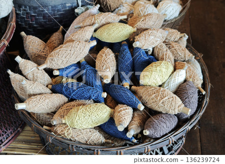 A group of yarns dyed with indigo and natural colors used in handicrafts and weaving. A group of yarns dyed with indigo and natural colors used in handicrafts and weaving. 136239724