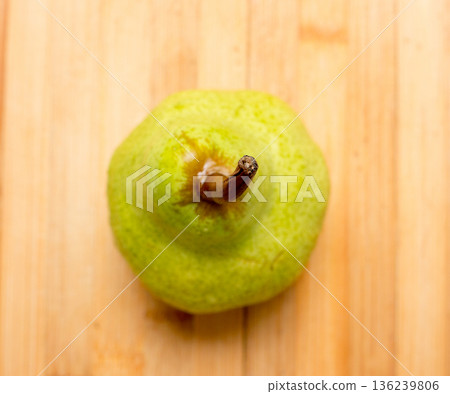 The vegetable Pear on a wooden background. The vegetable Pear on a wooden background. 136239806
