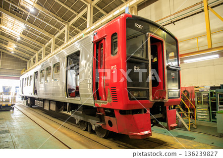 An 813 series train undergoing inspection at the Kokura General Rolling Stock Center (JR Kyushu) An 813 series train undergoing inspection at the Kokura General Rolling Stock Center (JR Kyushu) 136239827