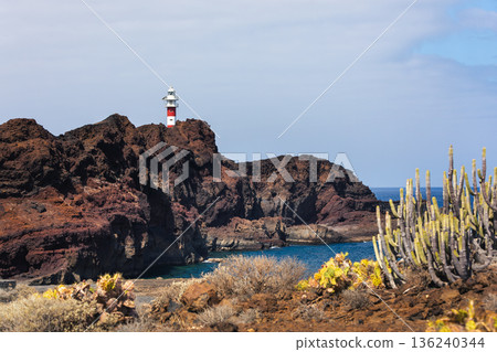 Rocky coastline of Tenerife with Punta Teno lighthouse 136240344