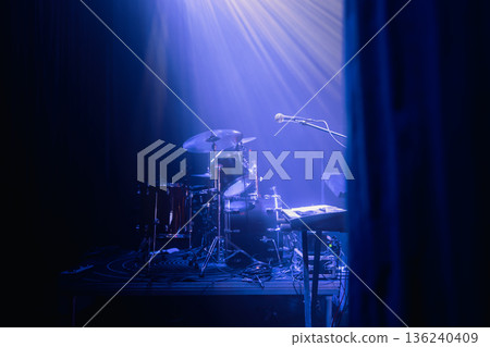 Empty concert stage with microphone in selective focus 136240409