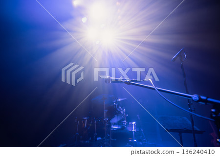 Empty concert stage with microphone in selective focus 136240410
