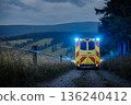 Ambulance car of emergency medical service on mountain road 136240412