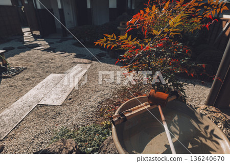 A Japanese garden's water basin and ladle - a tranquil Japanese space 136240670